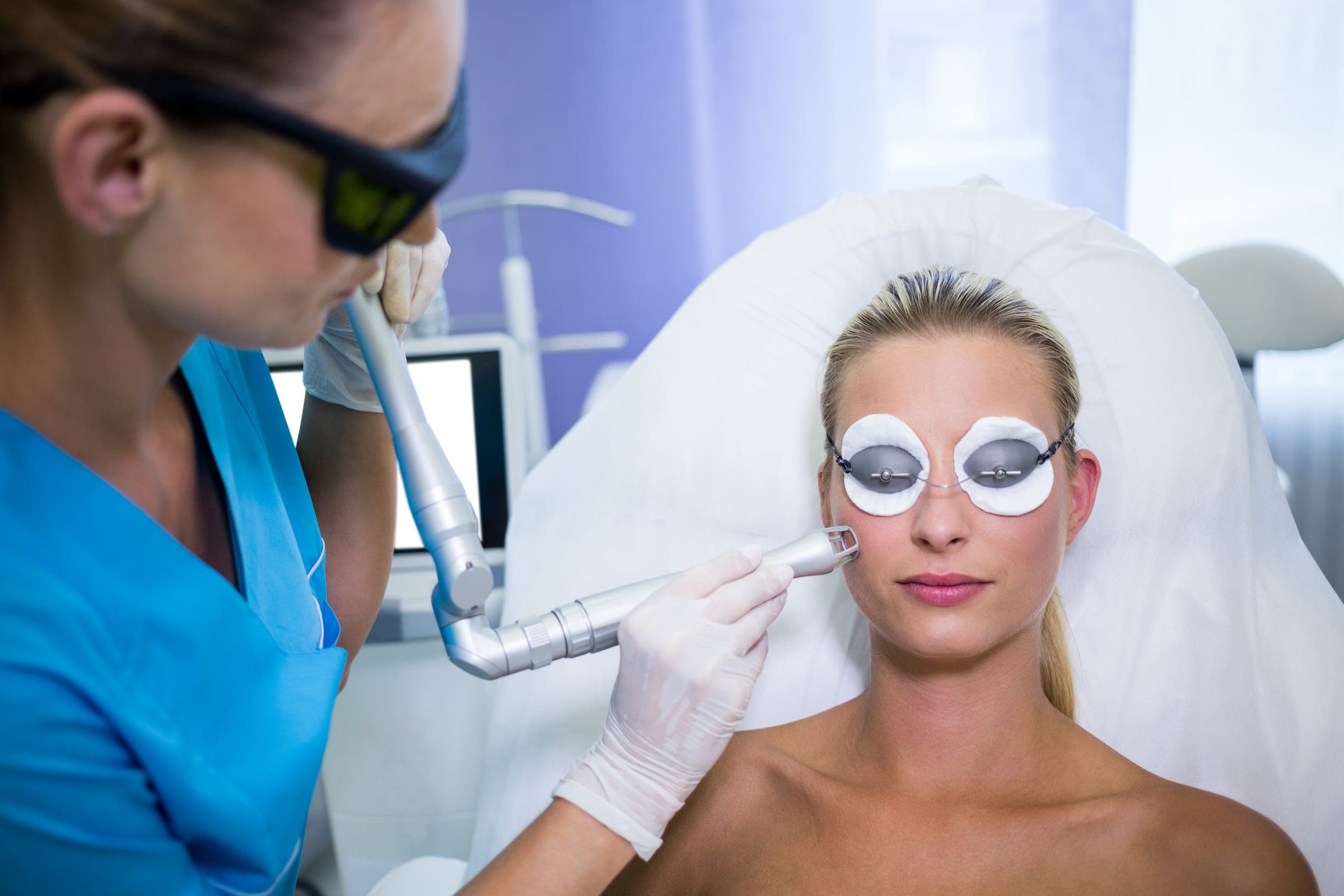 Laser facial treatment with protective eyewear
